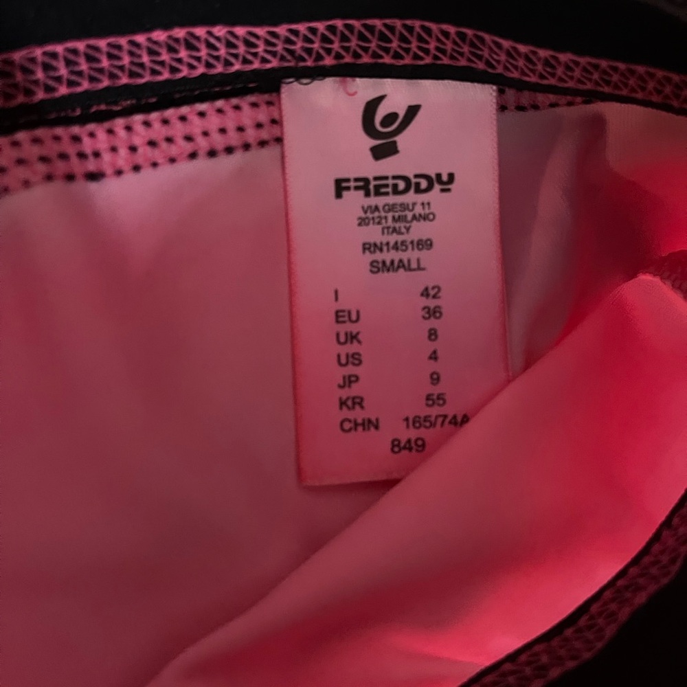 Selling A set of Freddy’s workout pants /pink is small and blue is extra small